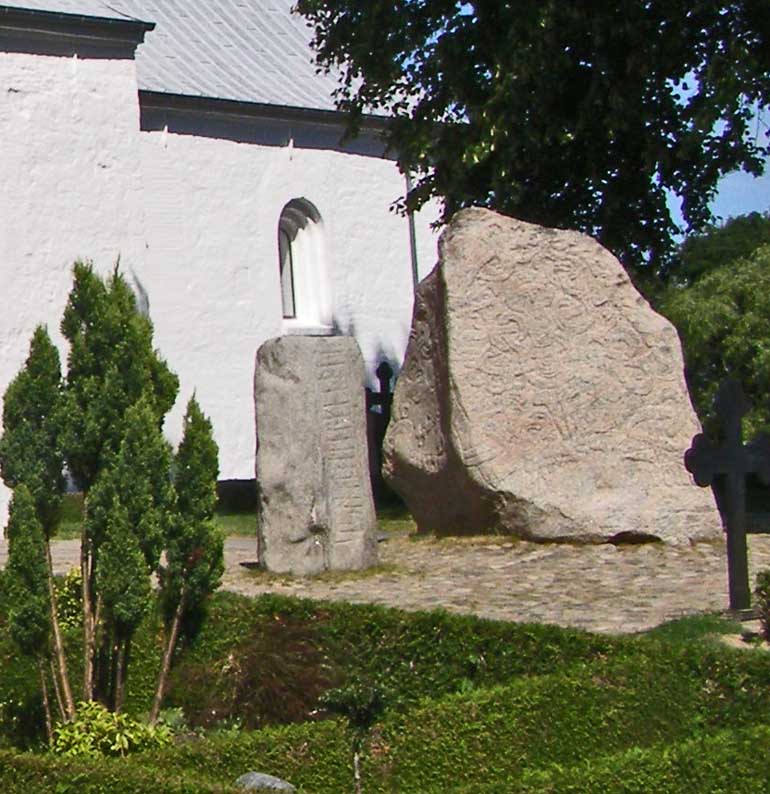 Jelling Stones Site in South Jutland (Sønderjylland). 
The site is within a present churchyard adjacent to the Jelling Mounds. 