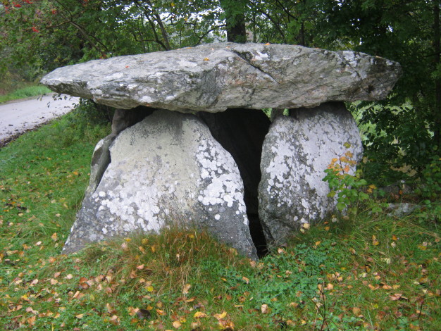 This one of my favourite sites in Sweden.  A lovely little dolmen right by the side of the gravel lane.  September 2011