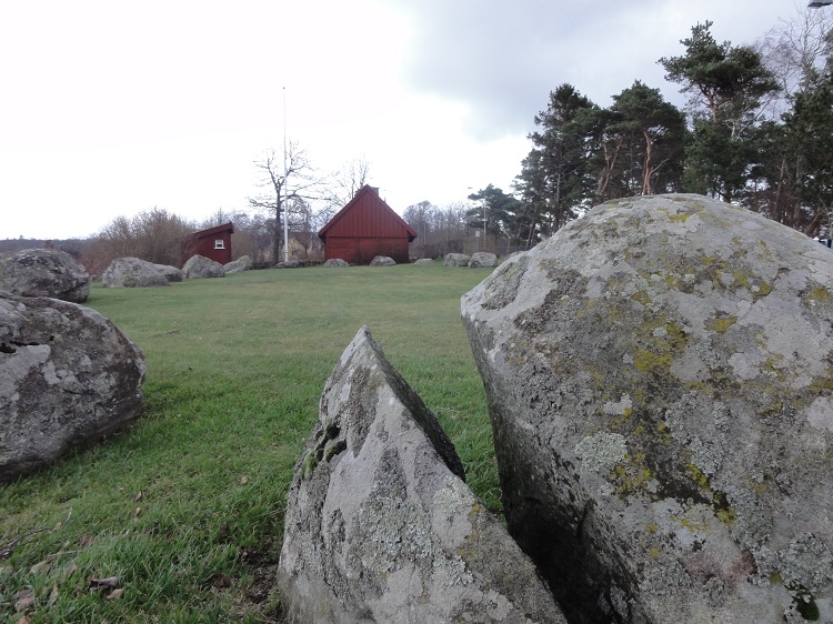 Behind the stone circle is a well-kept traditional building from the 17th century.

Site in Halland Sweden

