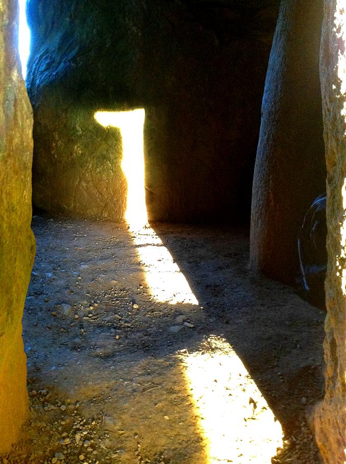 Bryn Celli Ddu June 20th. 2012, the sun shining on the back wall, the sun never shines on the upright pillar.