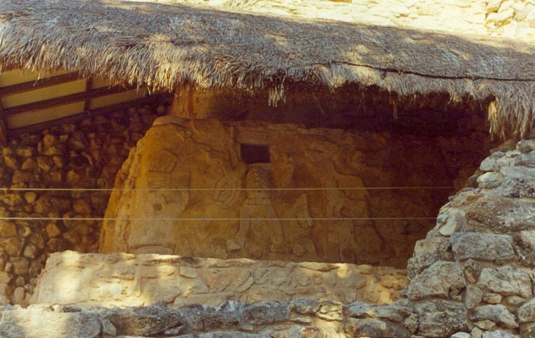 These carvings in Mayapan are located near the base of El Castillo (photo taken on March 2002).