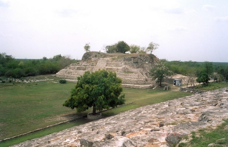 View from El Palacio to the main Plaza with a pyramid (photo taken on April 2005).