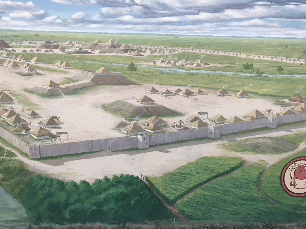 Herb Roe's reconstruction of the Kincaid Mounds in Illinois. The painting is on the floodwall murals in downtown Paducah, Kentucky.

Image courtesy Dr Greg Little, author of the Illustrated Encyclopedia of Native American Indian Mounds & Earthworks (2016).
