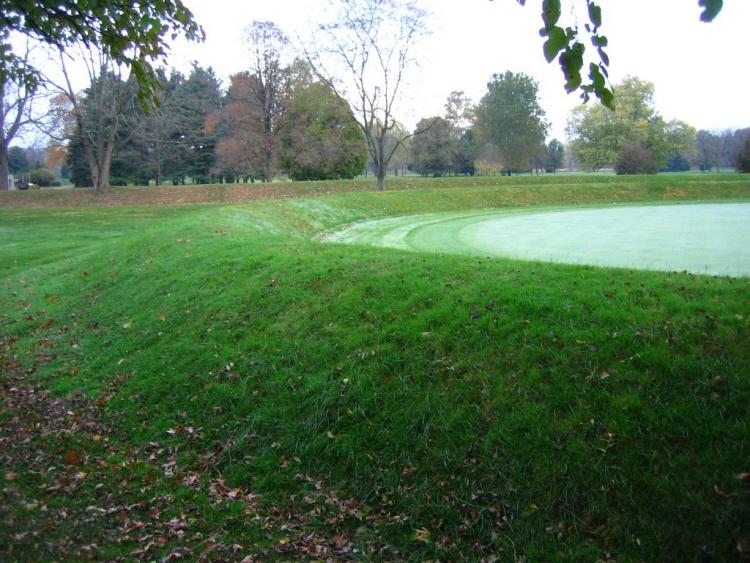 A portion of a small circular enclosure immediately east of the Octagon.  Unfortunately, a putting green has been sited to entirely fill the area. 
Photo - bat400, 4 Nov 2007.