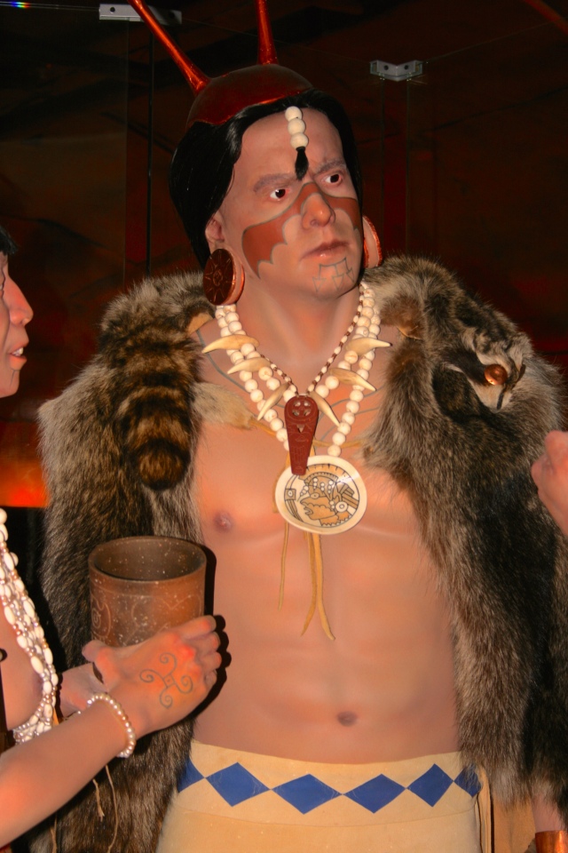 Life-size diorama at the Moundville, Alabama museum of an elite member of the mound society. He is wearing copper horns, freshwater pearls, animal claws/teeth, and a copper and shell gorget.   Photo courtesy Dr Greg Little, author of the Illustrated Encyclopedia of Native American Indian Mounds & Earthworks (2016). 