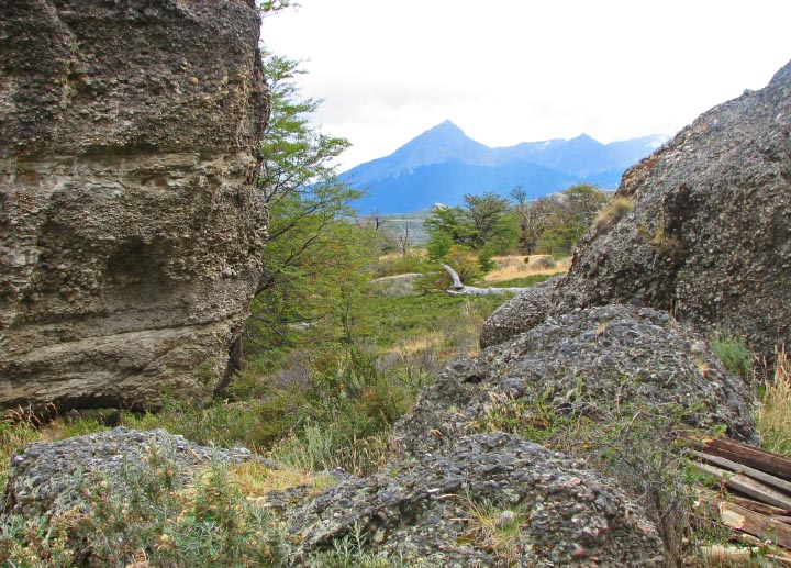 Site in Chile. 
Conglomerate boulders immediately outside the entrance to Grande Cueva del Milodon.  The view is toward the west. 
