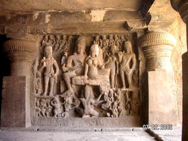 Ellora caves,Kailash temple,Lord Shiva  and Parvati.A little more then 25 KM from Aurangabad in Maharashtra state in India, a place of pilgrimage for Hindu,Buddhists and Jains ,it is ranked amongst the most magnificent of Indian sculptural sites. Dated to 7th to 9th century CE,rock carved temples and monasteries.
