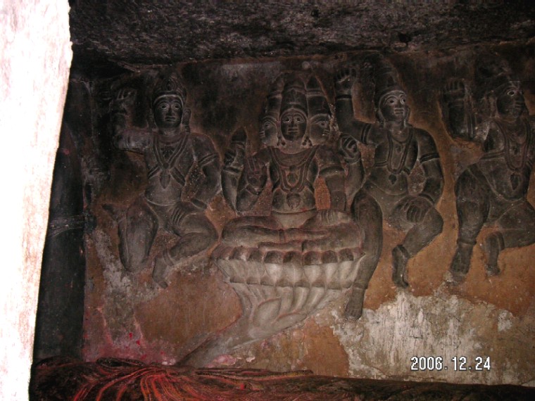Undavalli cave temple, Guntur district, Andhra Pradesh

lord Vishnu resting on the serpent Sesha between the distraction and the new creation of the universe,
lord Brahma seating on a lotus that coming out lord Vishnu's navel