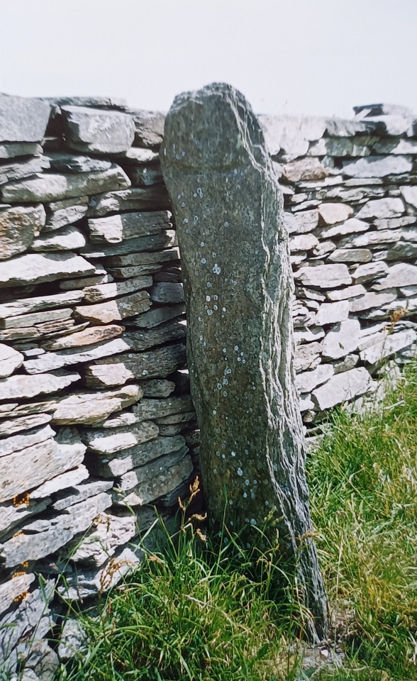 Pillar stone with engraved cross.