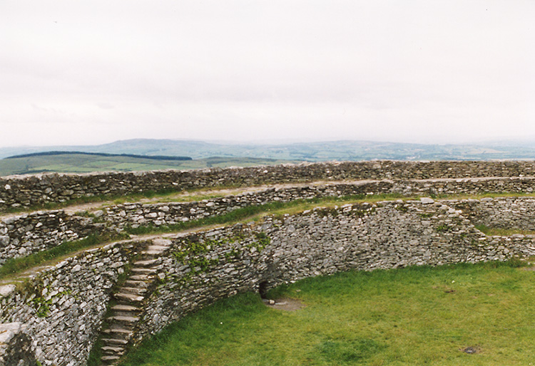 Another view of the interior terracing and the surrounding coutryside below the fort. (Scan of photo taken in 1997)