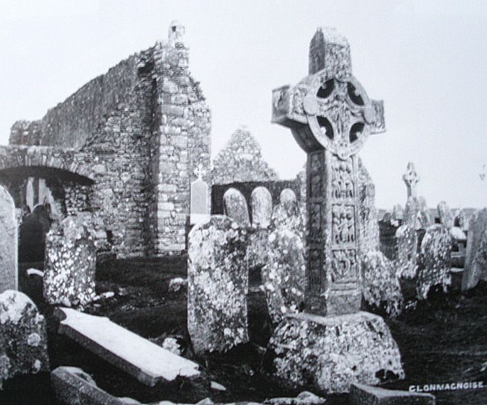 Cross of the Scriptures (South Cross) and monastic enclosure with Temple Doolin at Clonmacnoise, Co. Offaly.

Black & White photo taken between 1870-1914. [Lawrence Collection National Library of Ireland].

[From Clonmacnoise Studies Vol 1 Seminar Papers 1994 Edited by Heather A. King. Duchas, The Heritage Service Dublin 1998].