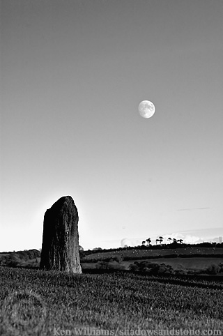A B&W for a change, simply a standing stone outside the pasage entrance and the moon.