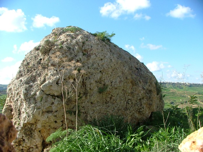 The huge 'guardian' boulder outside the cave.