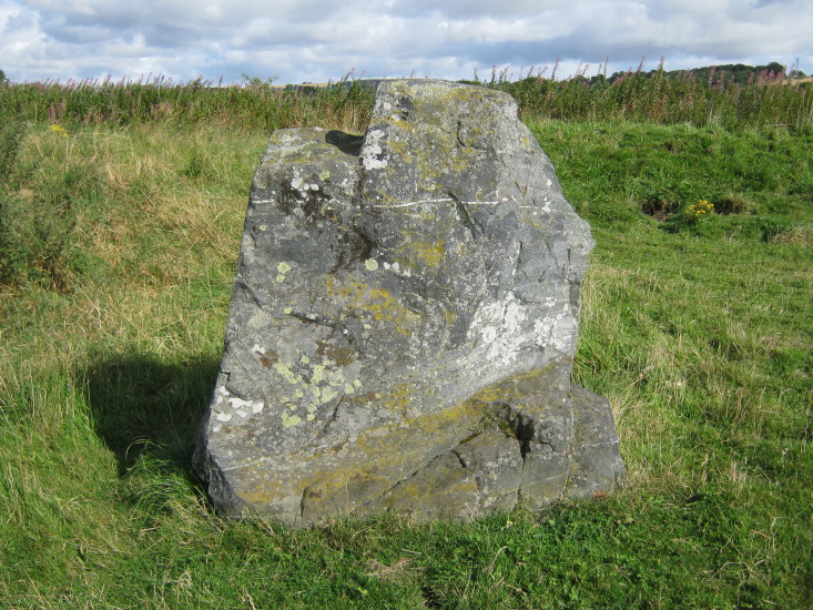 One of the two original stones (the third stone, a Pictish stone, has been recently moved here.  September 2012