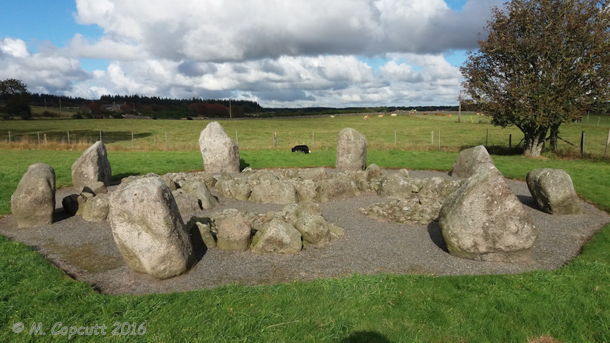 This is a very well looked after little stone circle with several burial cairns within it, making it look like a sort of flower. 