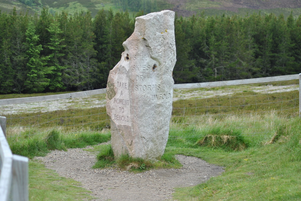 Standing stone near Corgarff Castle, Lecht Summit for NJ2508
From the viewpoint overlooking Corgarff Castle. Inscription on all four sides reads
'As still skies or storms unfold
Take a moment to behold
in sun, rain, sleet or snow
or warm your soul before you go'.

Copyright Ian M Reed and licensed for reuse under this Creative Commons Licence 