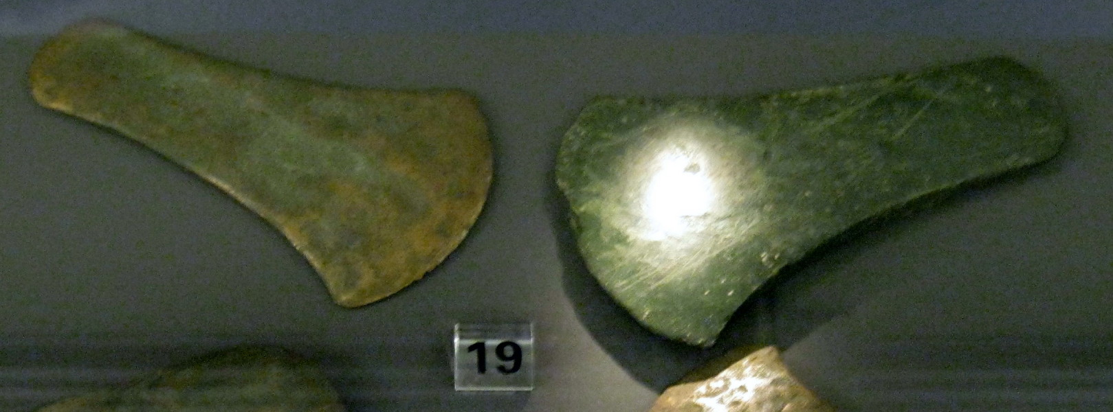 Two bronze flat axes from the Early Bronze Age around 3100 to 3800 years before present.  Found at Drumshade Farm, Angus.  Photographed in September 2012