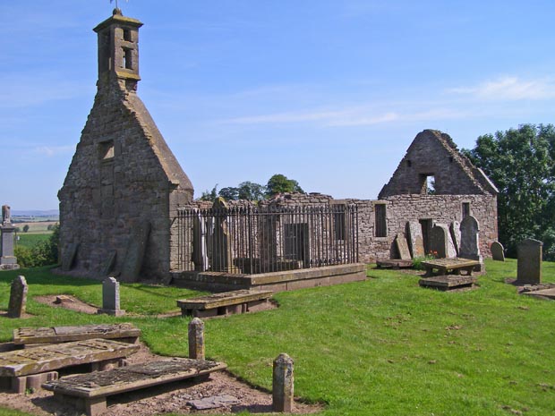 Eassie Church in ruin with part of the old graveyard. @ C. Michael Hogan
