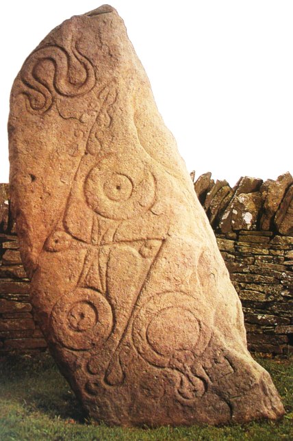 Aberlemno Pictish symbol stone stands next to the B9134 road outside the village. At 5 feet tall it is carved with symbols, a double-disc, serpent and Z-rod. It was probably a boundary stone that was Christianised in the 6th-8th century. On the reverse side there are cup-marks which could mean the stone itself is prehistoric.