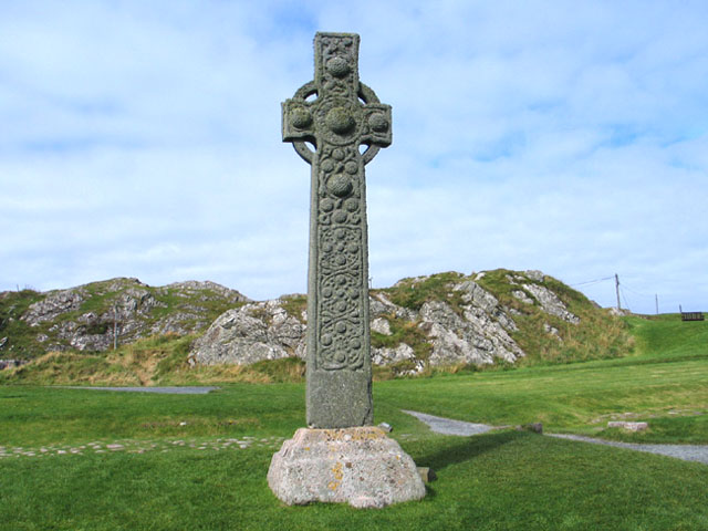 View of the other (East) side of the 8th Century St. Martin's Cross on Iona.  In background is Torr an Aba, where St. Columba's writing cell was.