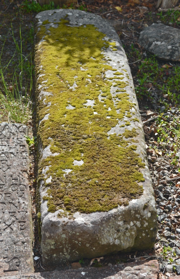 Externally, to the north west of the windmill tower, is a collection of stones and architectural stones, centred around NX 96963 75742.  A closer look one of three medieval grave markers.  Included here for completeness. 