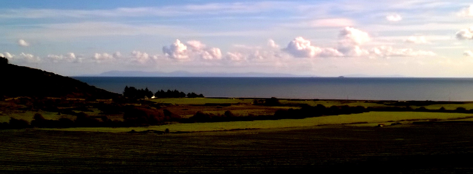 View from the cairn (or thereabouts) down the valley, and sea to Isle of Man 