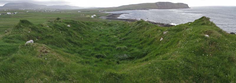 This composite of three photographs shows clearly the prominent hollow of Dun Bornaskitaig, encircled by ramparts over a metre high.