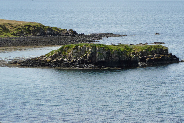The tidal island of Dun Maraig in Poll na h-Ealaidh has the vague remains of a fort on it. Once it was connected to the shore by a causeway, and it is still possible to walk across to it at very low tide.
Perhaps more interestingly, the small island was won as the star prize in a 1994 German TV game show by a Stefan Schluznus of Bremen. A pretty useless, but fun, sort of prize.

Copyright John 