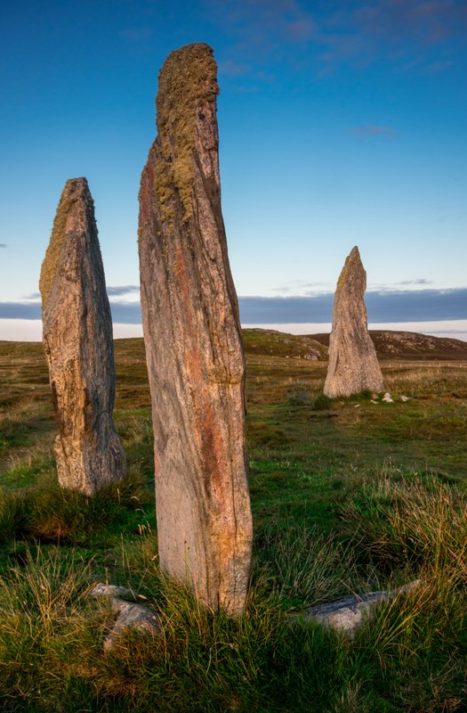 Cnoc Ceann a'Gharraidh (Callanish II). Photographed at sunset the stones seem to give off a lovely warm glow.