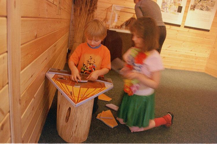 Young visitors enjoy the activities in the visitor centre.