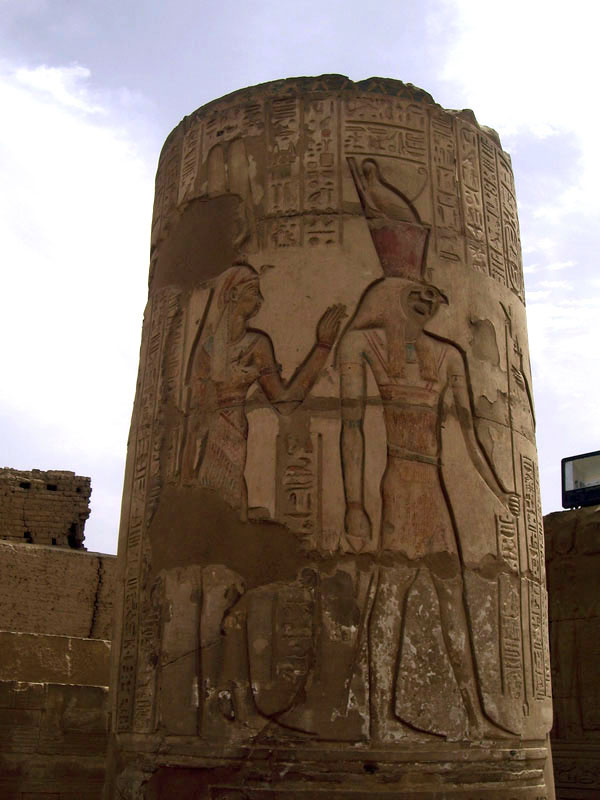 Detail on a short Courtyard pillar depicting the goddess Isis and falcon-headed god, Horus