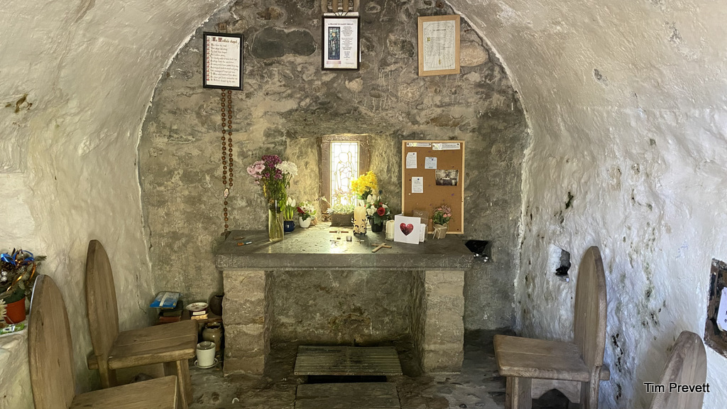 Interior of St Trillo's Chapel, the well itself is under the altar. 23rd July 2021.
