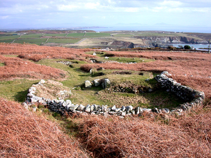 View South across the ancient settlement, over the sea, towards the Llyn Peninsular mountains.