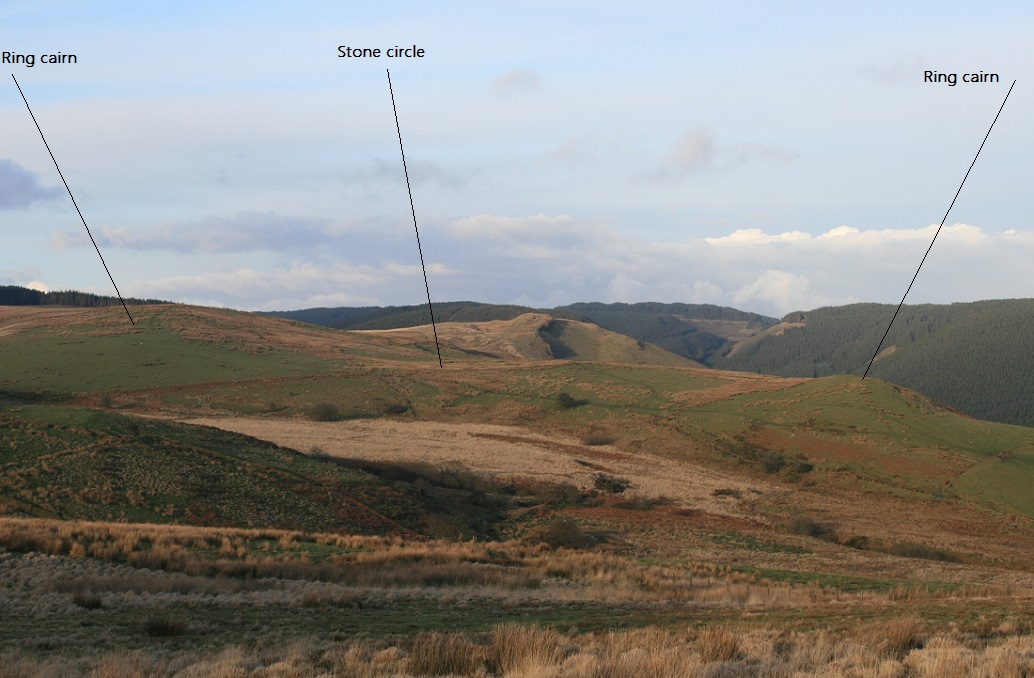 Cerrig Cynant in the middle and two peripheral ring cairns, the one on the right is best.