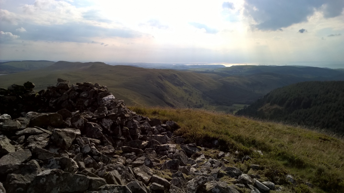 Looking SW. The cairn has a great view of the valley below.