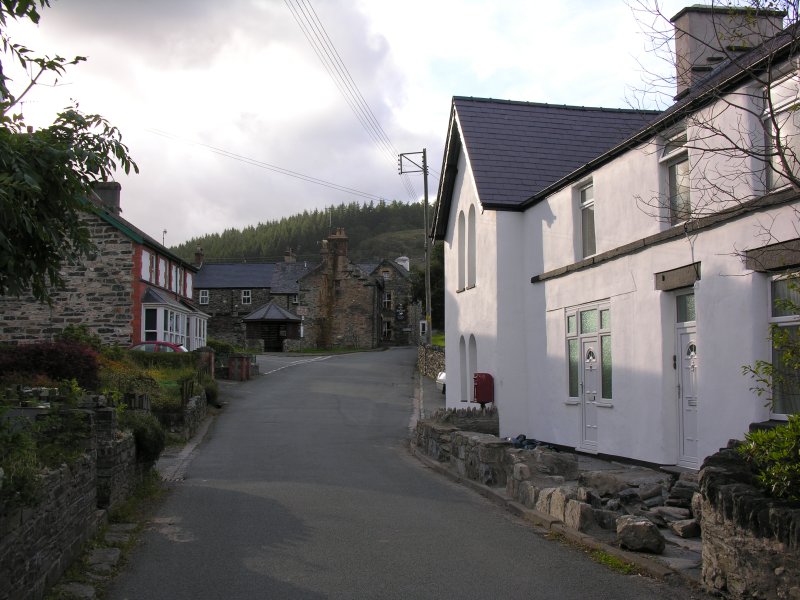 The site of St Tudclud's well is named in the Parish Church as in the cellar of the Post Office. After some investigative work, I found out this is most likely the white building on the right, here - on the north side of the road after going over the bridge towards the church. It's now a private residence.