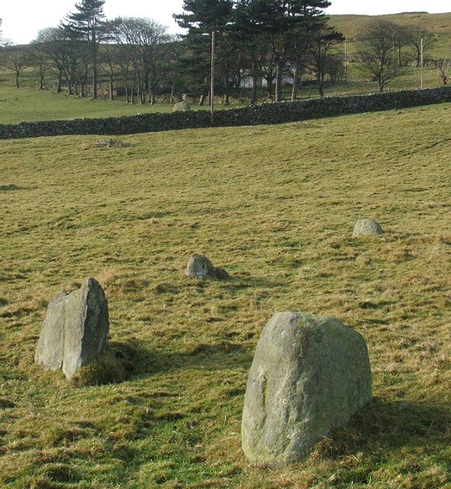 Looking over the remnants of Red Farm stone circle to Maen Crwn