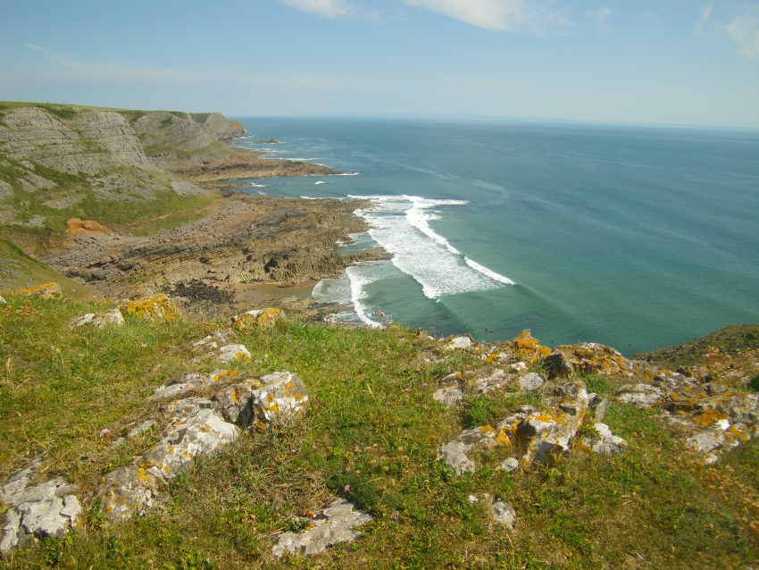 View from the Thurba Head hillfort - looking eastwards along the Gower coastline and cliffs

Photo, July 2011
