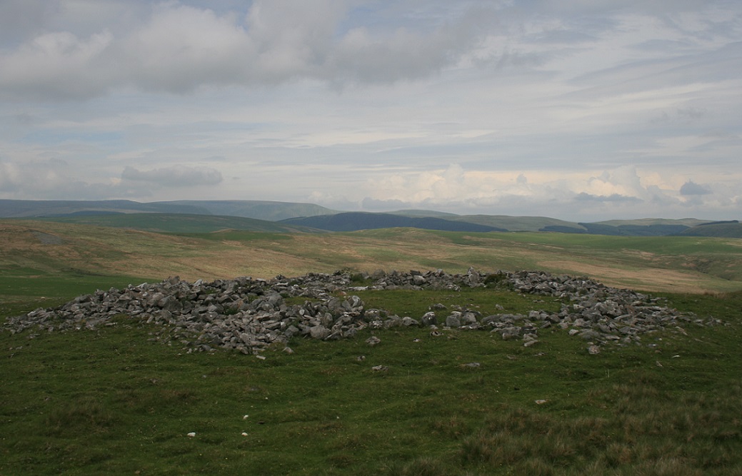 Site in Mid Glamorgan Wales, ring cairn and much hilly goodness.
