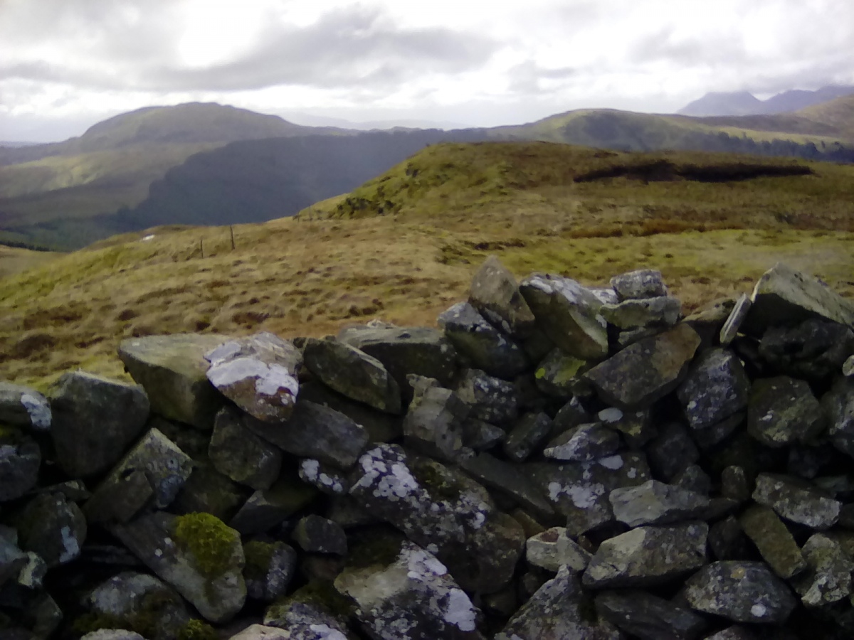 View to the West from the centre of the cairn with Manod Mawr and Moelwyn Bach in the distance. 