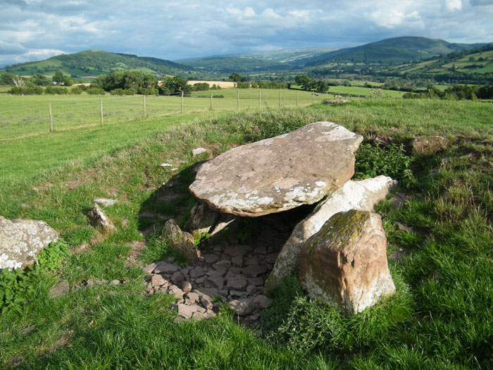 Looking South East, down the Usk valley. The pointy hill to the left is Yr Allt, with it's own Iron age hillfort on the summit. The far end of the valley as seen from here is Llangattock escarpment.